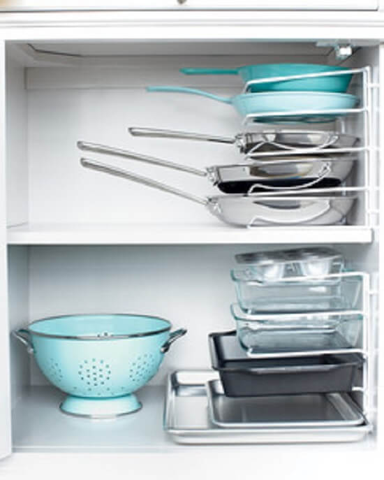 Use a bakeware organizer to stack pans. #Kitchen #KitchenOrganization #KitchenDecor #KitchenStorage