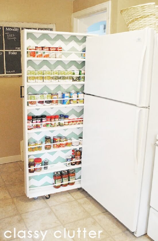 Build a DIY Canned Food Organizer in between the space of the wall and the fridge. #Kitchen #KitchenOrganization #KitchenDecor #KitchenStorage