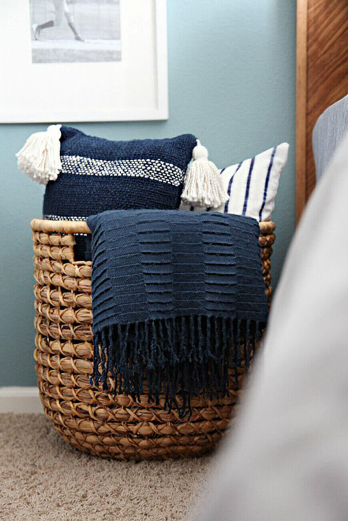 Small Bedroom Organization Ideas: Uber Functional Rustic Wicker Basket #smallbedroomideas #smallbedroomstorageideas #spacesaving #bedroomideasforsmallrooms