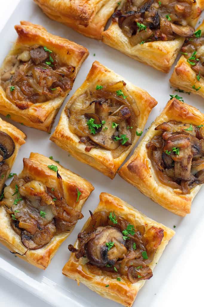 Gruyere Mushroom Caramelized Onion Bites via Little Spice Jar. Easy, simple, and flavorful Christmas lunch ideas for your families! They're also the perfect meal prep recipes so you can save time during this busy season! Christmas recipes #holidays #recipe #healthymeals. make ahead
