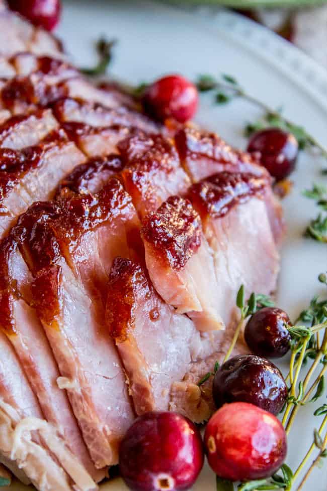 Oven Roasted Cranberry Dijon Glazed Ham via The Food Charlatan. Easy, simple, and flavorful Christmas lunch ideas for your families! They're also the perfect meal prep recipes so you can save time during this busy season! Christmas recipes #holidays #recipe #healthymeals. make ahead