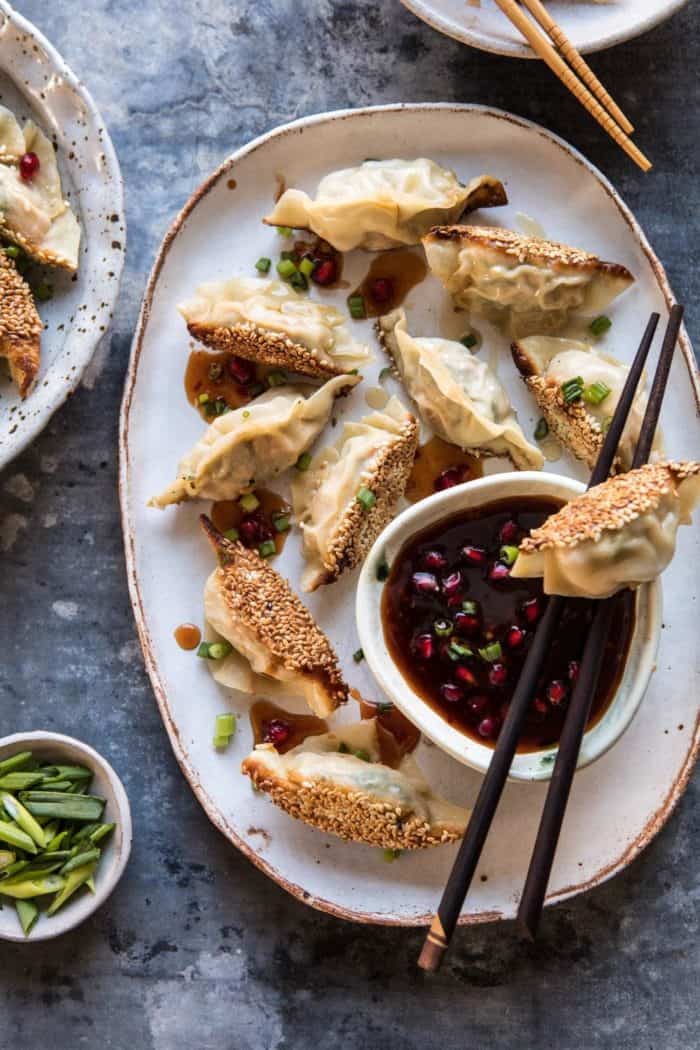 Ginger Sesame Chicken Potstickers with Sweet Chili Pomegranate Sauce