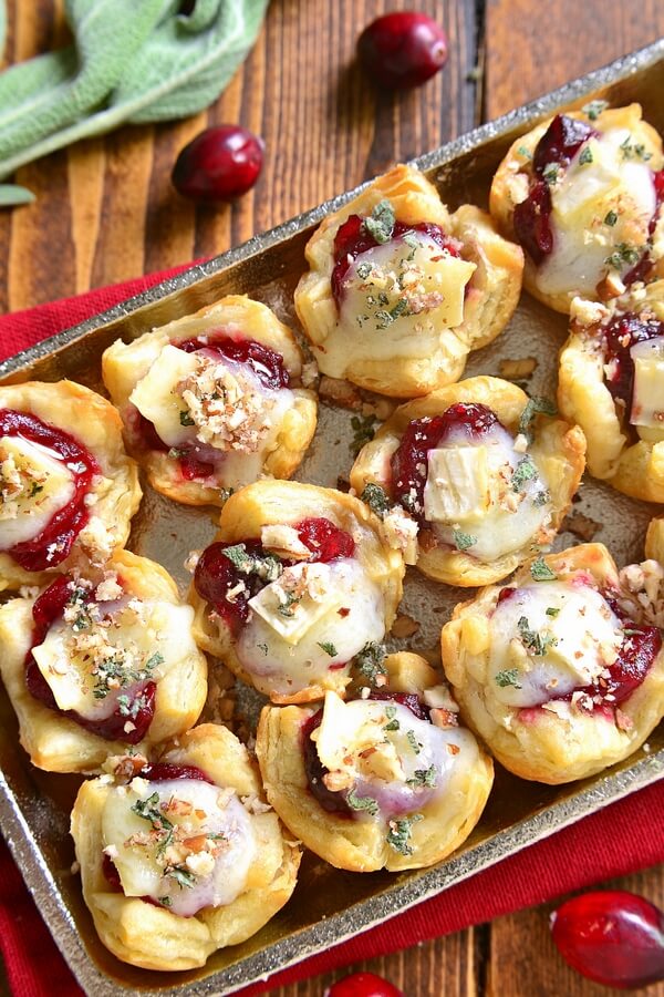 New Year's Eve appetizers. Looking for easy party appetizers, finger foods, and canapes for a crowd? These make ahead New Year's Eve appetizers are also perfect for for birthdays and other holiday parties. You can find party appetizers: garlic cheese bread, dips, cold appetizers and cheap snacks if you're on a budget. #partyappetizers #fingerfood #canapes #newyearseve #appetizers