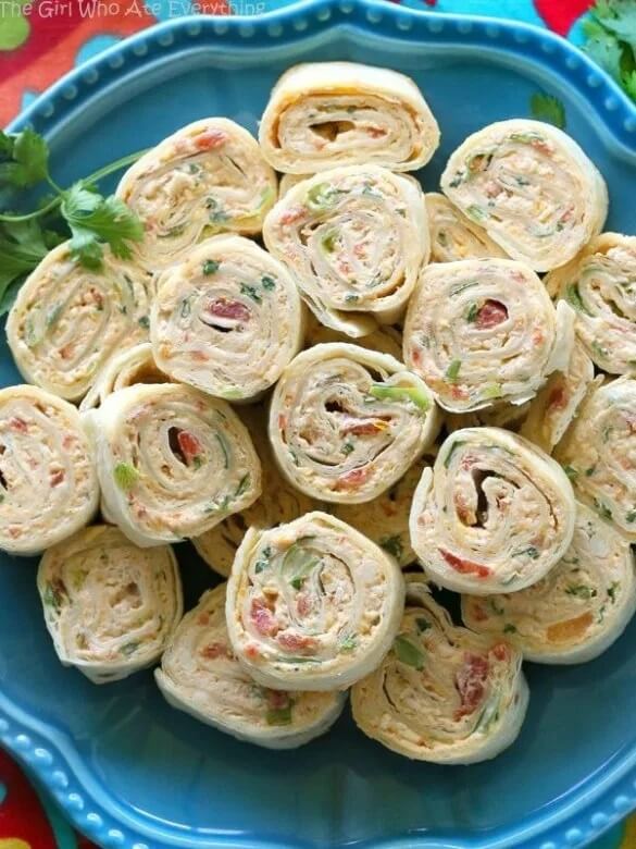 35 Easy Game Day Appetizers Perfect For Super Bowl Party! | Looking for easy game day recipes to wow your football loving friends? We have the best and tastiest collection of finger foods, pin wheel recipes with cream cheese or tortilla roll ups! Serve them as appetizers during game day or take as lunch to work.#superbowl #gameday #pinwheels #rollups #pinwheelrecipes #appetizers #pinwheelappetizers #partyappetizers #fingerfood #footballappetizers