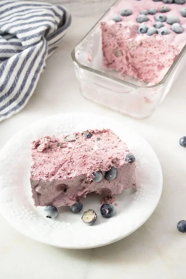 WW Blueberry Dessert get the full recipe on  Kimspired DIY. 50 Quick & Easy Weight Watchers Desserts With SmartPoints. Looking for yummy Weight Watchers desserts with points or freestyle points?These tasty freestyle weight watchers desserts include everything from Cheesecake to chocolate cake to pancakes with cool whip and everything in between! #weightwatchers #weightwatchersdesserts #weightwatchersrecipes #weightwatchersdessertsfreestyle #easy #healthy #smartpoints #wwdesserts #freestyle #desserts #healthydesserts