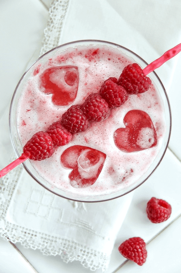 Valentine's day cocktails. Looking for easy & classic Valentine's Day Cocktails to set the mood? We've put together some of the best cocktails guaranteed to impress your loved ones!#valentinesday #cocktails #drinks #valentines #partyideas