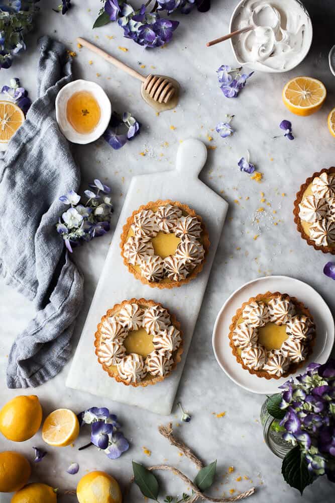 Craving for something sweet this spring and summer? We have lemon bars, cakes, tarts, cookies, cheesecake, and more best easy lemon dessert recipes for you to try! spring dessert recipes, summer dessert, summer dessert recipes.