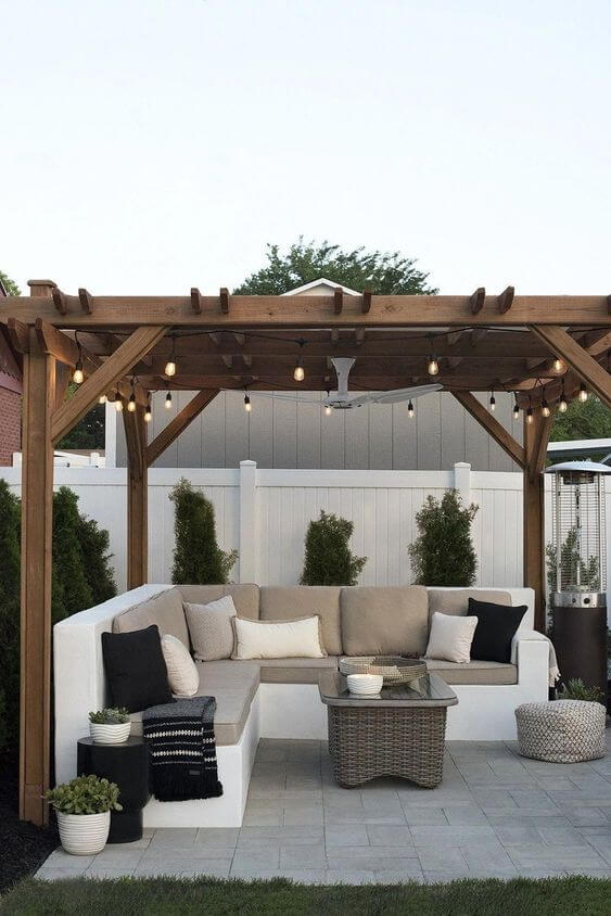 Let the fresh air flow whether you have a tiny, narrow patio or a large garden with our stylish outdoor patio design ideas. Check them out! small backyard patio design ideas | patio design ideas on a budget | #outdoorspaces | #modernpatiodesign | #patiodesignlayout #pergolas #SharpAspirant