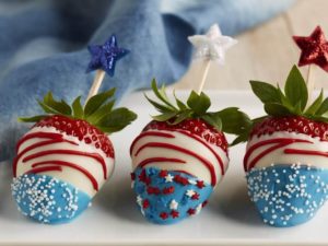 Flag Fruit Tray via Pasion for Savings. These 22 festive and fun 4th of July party food ideas are guaranteed to impress everyone! They are perfect for a large crowd and even kids and adults will love. Find appetizers, BBQ, desserts, and other red, white and blue recipe ideas here!