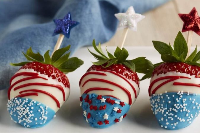 Flag Fruit Tray via Pasion for Savings. These 22 festive and fun 4th of July party food ideas are guaranteed to impress everyone! They are perfect for a large crowd and even kids and adults will love. Find appetizers, BBQ, desserts, and other red, white and blue recipe ideas here!