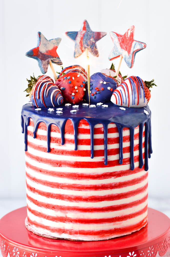 4th of July Cake via Partylicious. These 22 festive and fun 4th of July party food ideas are guaranteed to impress everyone! They are perfect for a large crowd and even kids and adults will love. Find appetizers, BBQ, desserts, and other red, white and blue recipe ideas here!