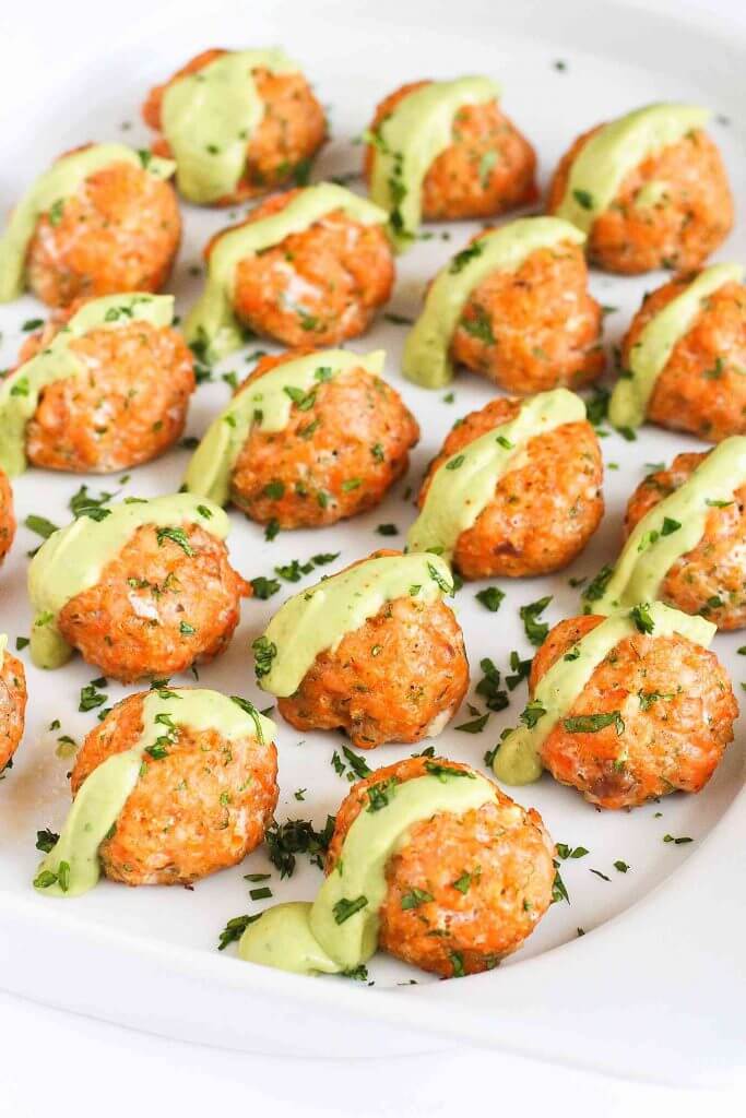 Baked Salmon Meatballs with Creamy Avocado Sauce via Cookin Canuck. Healthy, easy, and incredibly delicious salmon recipes you'll want to eat over and over again for breakfast,  lunch, or dinner! Find baked salmon, grilled salmon, smoked, pan-seared, and more!