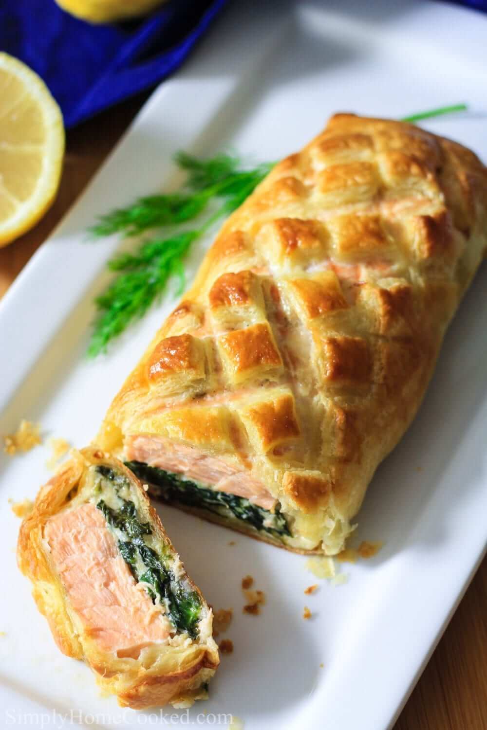 Salmon Wellington via Simply Home Cooked. Healthy, easy, and incredibly delicious salmon recipes you'll want to eat over and over again for breakfast,  lunch, or dinner! Find baked salmon, grilled salmon, smoked, pan-seared, and more!