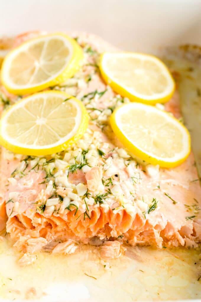 Easy Baked Salmon Recipe with Lemon Herb Butter via Lemon Blossoms. Healthy, easy, and incredibly delicious salmon recipes you'll want to eat over and over again for breakfast,  lunch, or dinner! Find baked salmon, grilled salmon, smoked, pan-seared, and more!