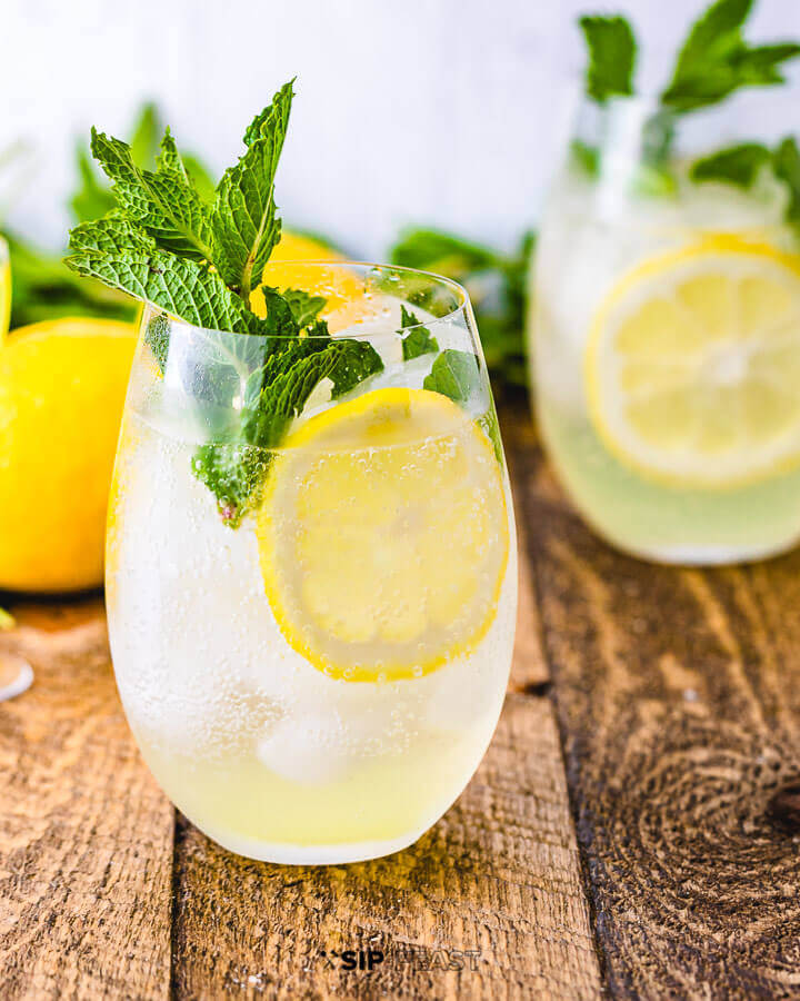 Limoncello Spritz get the full recipe on SIP AND FEAST. These easy cocktail recipes are a refreshing treat to beat the heat this summer! Find mojito recipes, lemonade cocktails, Hawaiian mimosas, tequilas, and more!