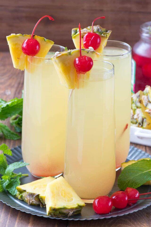 Hawaiian Mimosas get the full recipe on CRAZY FOR CRUST. These easy cocktail recipes are a refreshing treat to beat the heat this summer! Find mojito recipes, lemonade cocktails, Hawaiian mimosas, tequilas, and more!