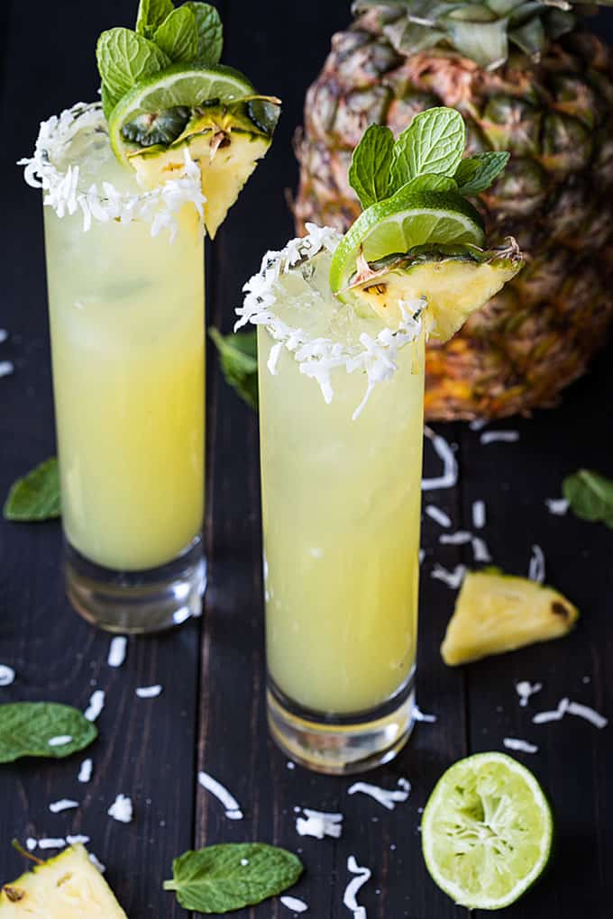 Pineapple Coconut Mojitos get the full recipe on THE Blond COOK. These easy cocktail recipes are a refreshing treat to beat the heat this summer! Find mojito recipes, lemonade cocktails, Hawaiian mimosas, tequilas, and more!