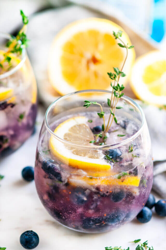 Blueberry Thyme Gin Fizz get the full recipe on Aberdeen's Kitchen. These easy cocktail recipes are a refreshing treat to beat the heat this summer! Find mojito recipes, lemonade cocktails, Hawaiian mimosas, tequilas, and more!