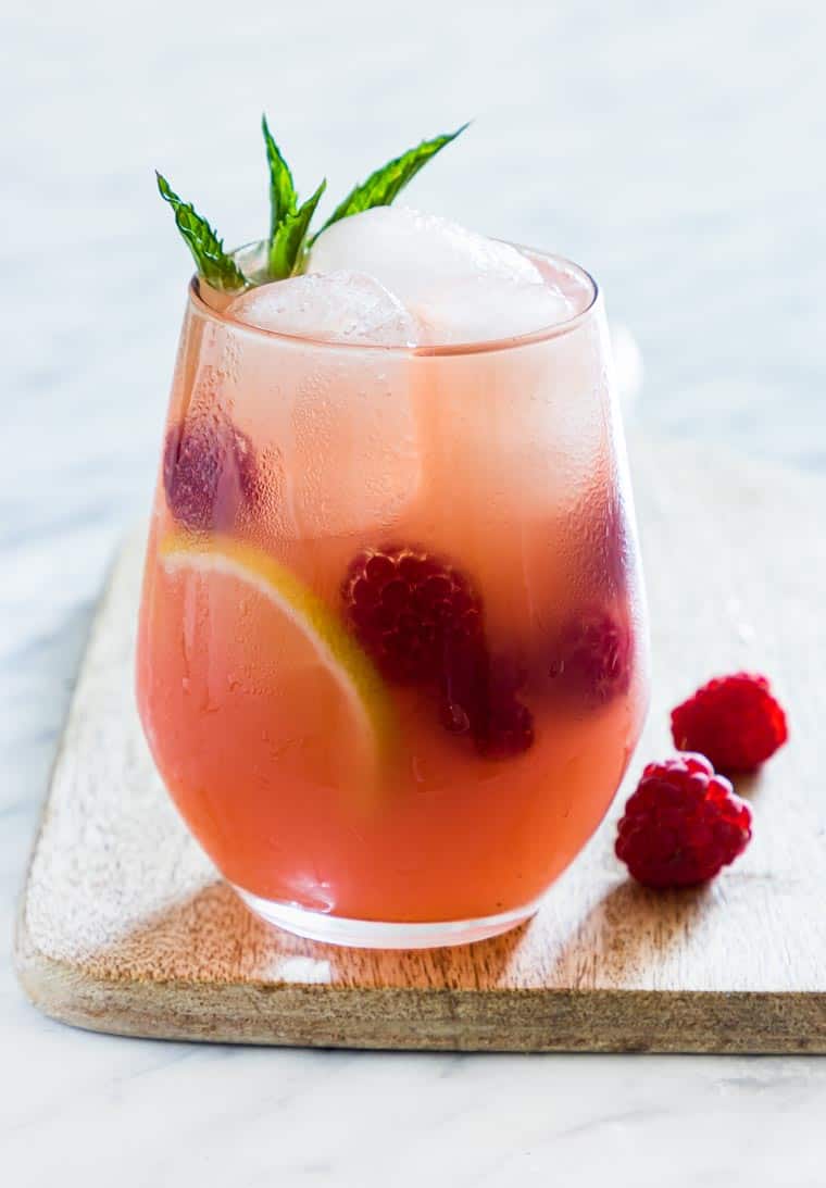 Raspberry Vodka Lemonade Cocktail get the full recipe on Recipes from a Pantry. These easy cocktail recipes are a refreshing treat to beat the heat this summer! Find mojito recipes, lemonade cocktails, Hawaiian mimosas, tequilas, and more!