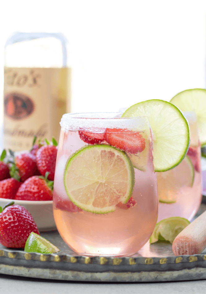 Strawberry Lime Vodka Tonic get the full recipe on Cooking with Amber - Simply Made Recipes. These easy cocktail recipes are a refreshing treat to beat the heat this summer! Find mojito recipes, lemonade cocktails, Hawaiian mimosas, tequilas, and more!