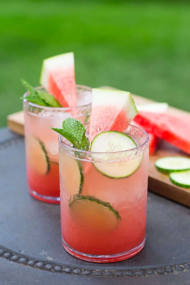 Watermelon & Cucumber Mojitos get the full recipe on THE KITCHEN IS MY PLAY GROUND. These easy cocktail recipes are a refreshing treat to beat the heat this summer! Find mojito recipes, lemonade cocktails, Hawaiian mimosas, tequilas, and more!