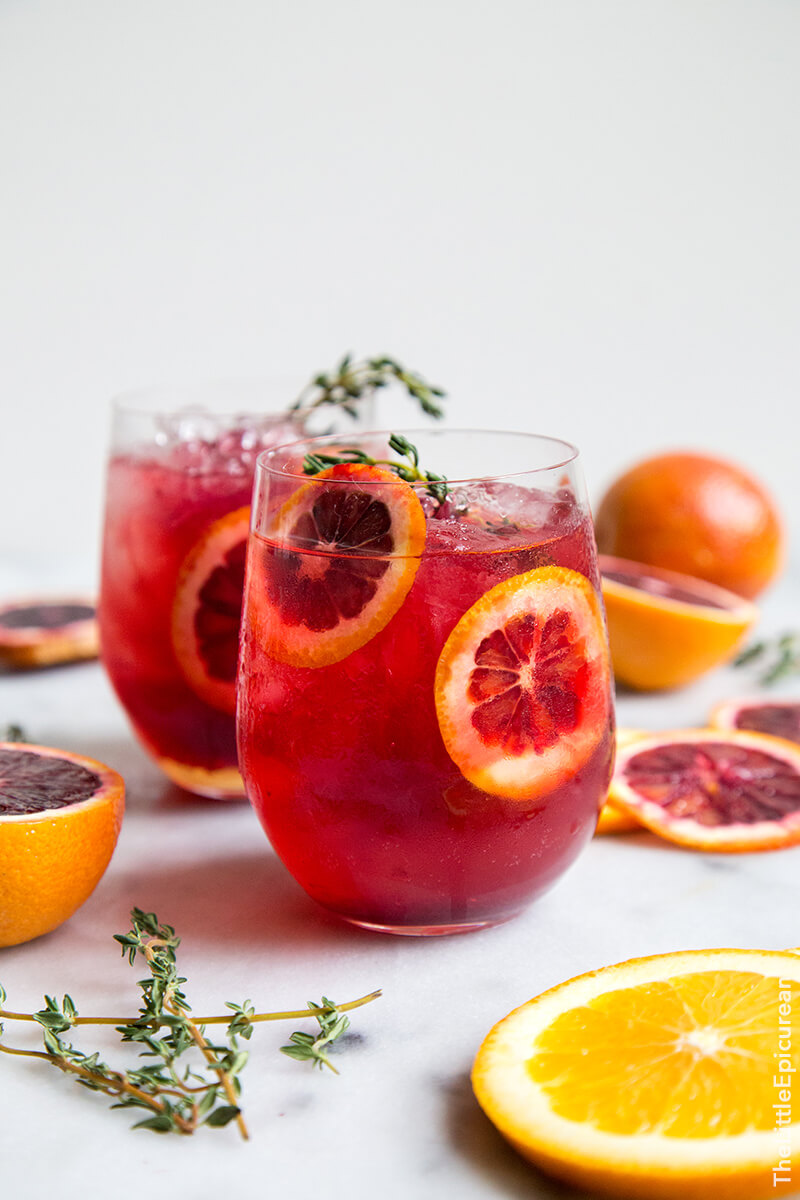 Blood Orange Elderflower Gin Cocktail get the full recipe on THE LITTLE EPICUREAN. These easy cocktail recipes are a refreshing treat to beat the heat this summer! Find mojito recipes, lemonade cocktails, Hawaiian mimosas, tequilas, and more!