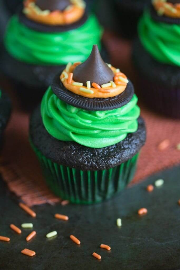 Get creative with these easy cute Halloween cupcake ideas your kids will devour! Add these yummy cupcake recipes to your Halloween party foods and start baking! halloween cupcakes ideas | halloween cupcakes decorations | halloween cupcakes for kids | halloween cupcakes easy | halloween cupcakes | halloween cupcakes decoration scary | Image via Tastes Better from Scratch