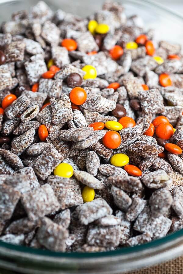 a sweet and salty party snack mix with Chex cereal, chocolate, and peanut butter