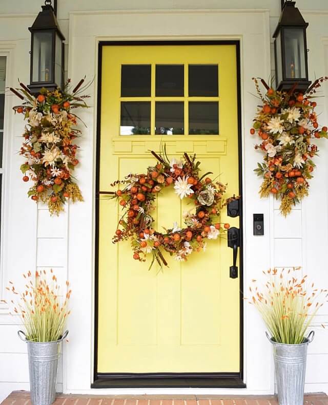 Adorable Fall Porch Ideas - easy and simple ways to make your front porch feel cozy and warm this autumn season!These fall porch ideas will show you how to easily create an autumn-ready porch using simple decors such as fall signs, wreaths, pumpkins, plants, and more! Image Via Simplysoutherncottage