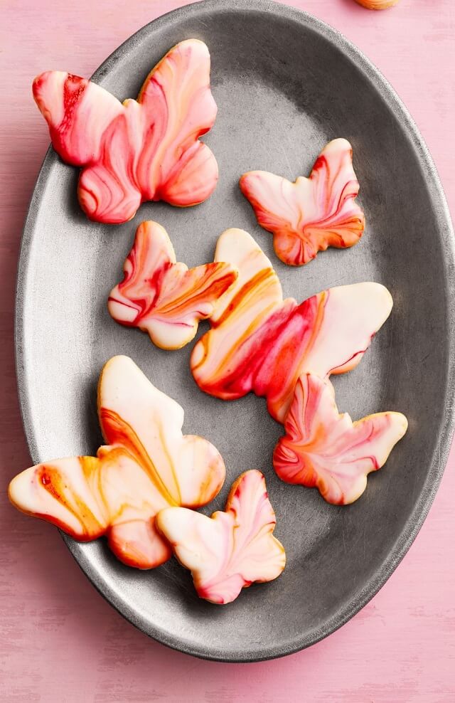 This marbled decorating approach is simpler than it appears: all you need to do is dip the cookies in a swirling icing—no piping required!