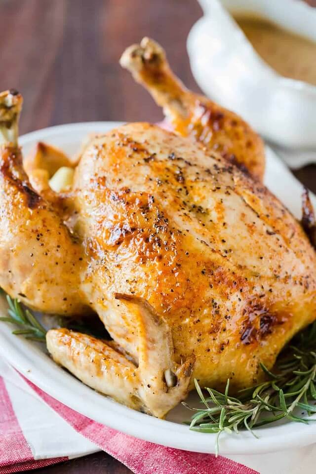 Whole chicken cooked in the Instant Pot is extremely juicy, and the 3-ingredient chicken gravy produced from the drippings is delicious.