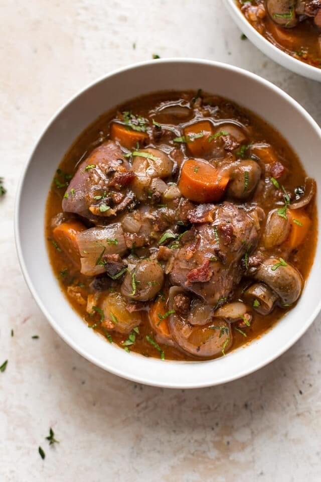 Coq au Vin (braised chicken in red wine) is a traditional French stewed chicken dish.