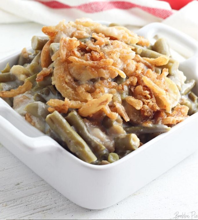 Cream of Mushroom Soup, Milk, Spices, and Tender Green Beans are Slow Cooked together and topped with Crispy Fried Onions.