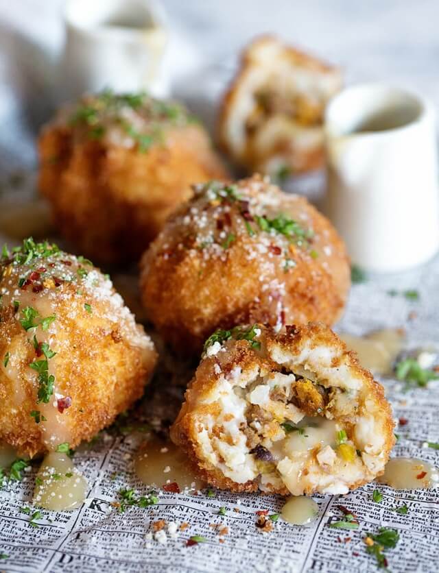What's not to love about these panko-dipped, deep-fried balls filled with dressing, minced turkey, and Parmesan cheese before being covered in gravy?