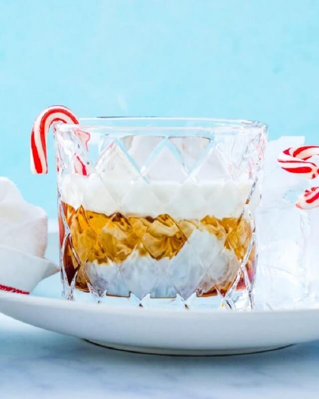 Your holiday season will be cheered up by this list of 12 Easy Christmas cocktails! From a warm glass of eggnog to cozy cocktails with seasonal accents, there's an impressive cocktail to get everyone in the Christmas spirit and amaze all of your holiday guests.