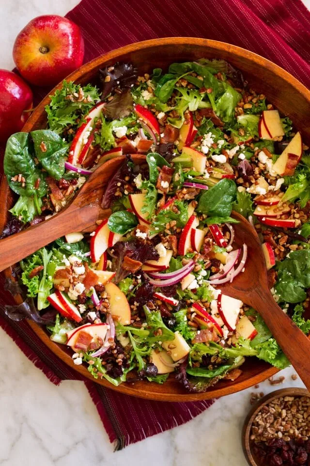 Try serving one of these Christmas salad recipes at your holiday gathering this year. They're bursting with holiday cheer and festive flavors like pomegranate seeds that are still juicy, citrusy dressings, and roasted vegetables.