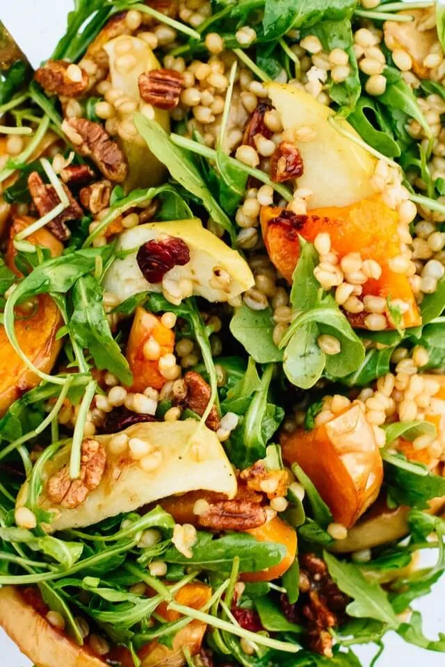 Try serving one of these Christmas salad recipes at your holiday gathering this year. They're bursting with holiday cheer and festive flavors like pomegranate seeds that are still juicy, citrusy dressings, and roasted vegetables.