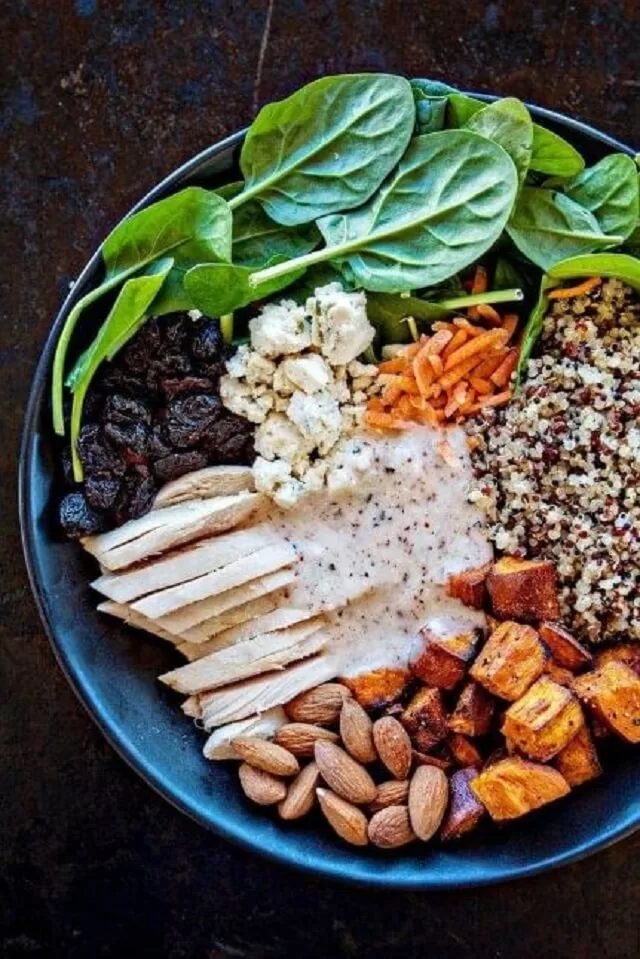 With this Winter Spinach Chicken Salad Quinoa Power Bowl with Creamy Almond Balsamic Dressing, you can refuel and support heart health.