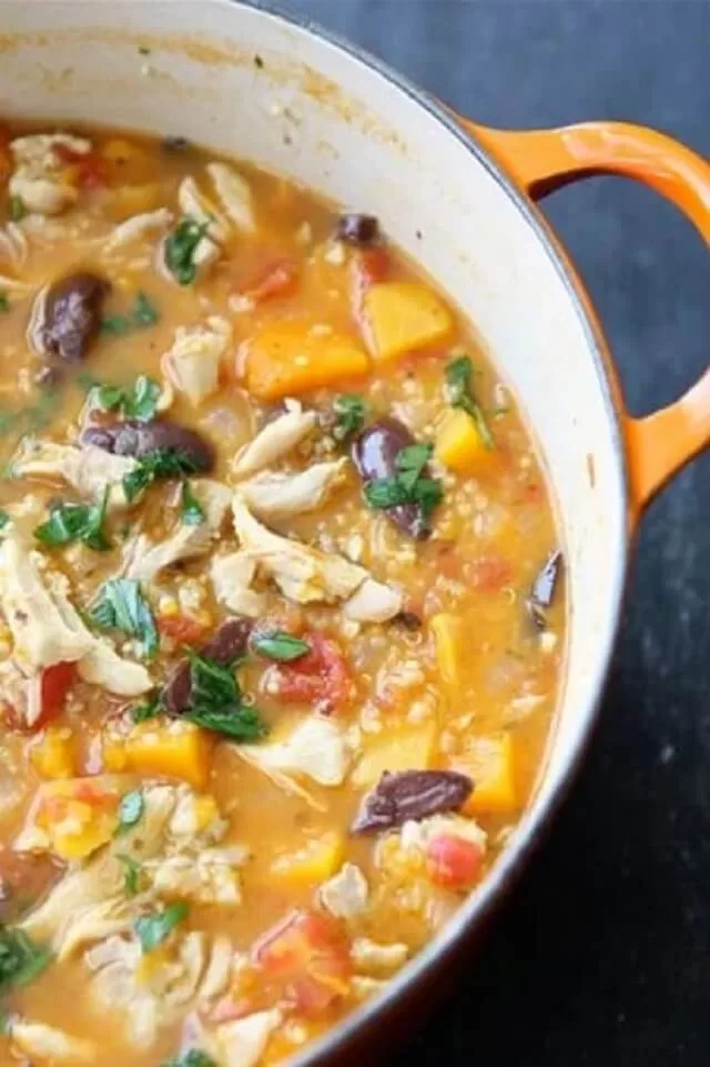 This stew can be prepared ahead of time, but because the quinoa will expand as it sits, you might need to add a little more chicken broth just before serving.