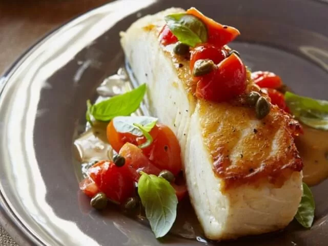 This Keto Baked Halibut with Tomato and Basil recipe is a delicious and healthy dish that is sure to impress.