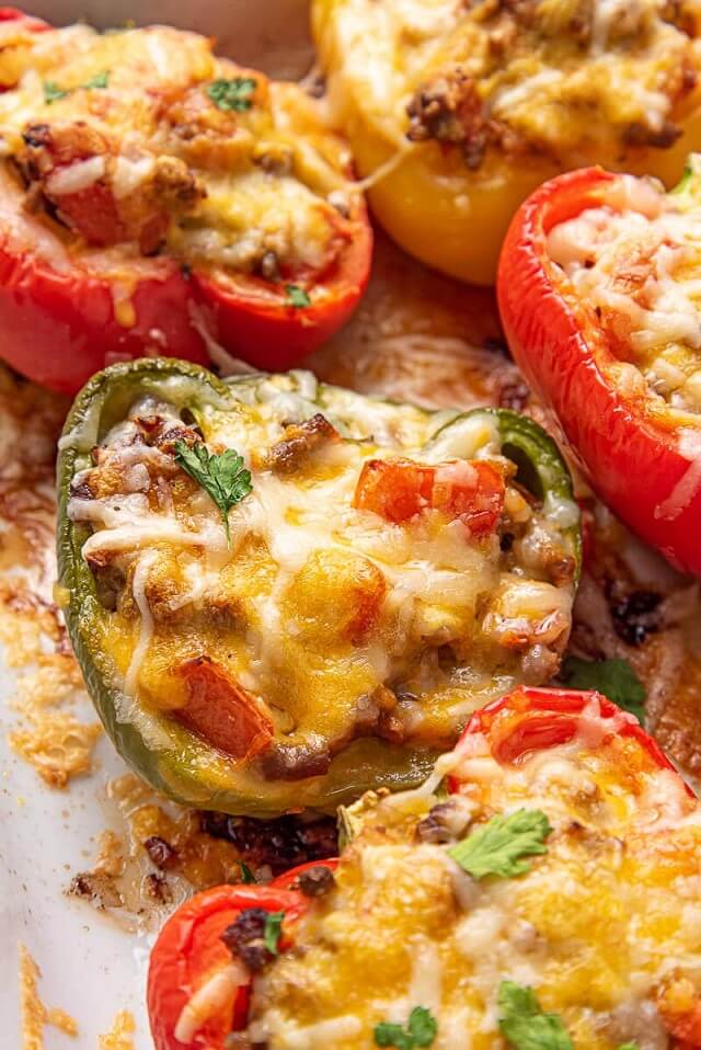 Made with ground beef, cauliflower rice, and topped with melted cheese, these stuffed peppers are sure to be a hit.