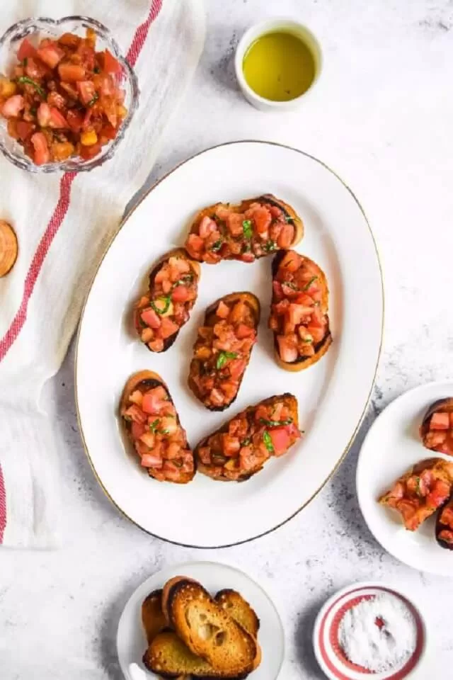 A list of 12 must-try Italian appetizers that will leave you wanting more! Whether you're entertaining guests or just looking for a delicious snack, these dishes are sure to satisfy you.