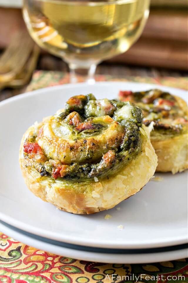 These spinach appetizers are a party essential that vanishes in no time! With a lineup of pinwheels, dips, and stuffed mushrooms, spinach takes the spotlight in these delightful bites.