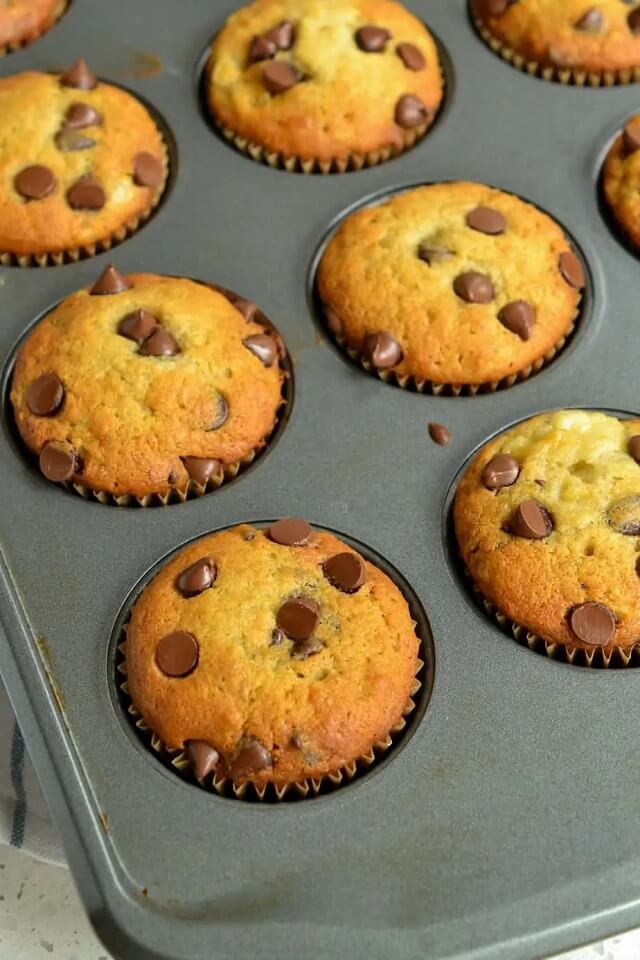 these delightful Banana Chocolate Chip Muffins that are not only quick and moist but also the perfect solution for those overripe bananas you're never quite sure what to do with!