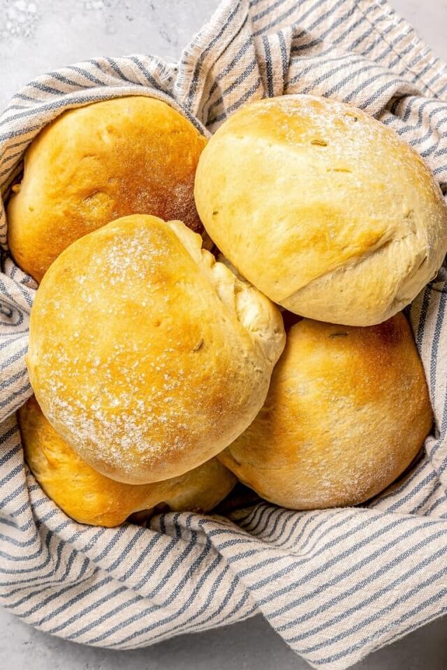 Cemitas. Lightly dusted with flour, they're just waiting to be dipped into your morning coffee or spread with jam for a delightful breakfast treat.