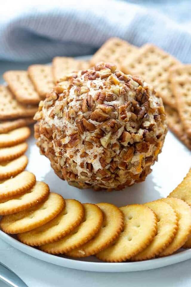 These Christmas cheese ball ideas are the ultimate crowd-pleasing appetizers for the holidays! They’re easy to make, packed with flavor, and can be dressed up to fit the holiday vibe.