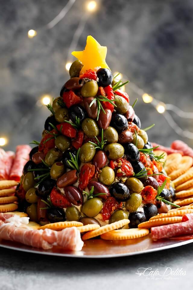 Forget traditional platters. This festive creation is next-level. Packed with sun-dried tomatoes, red bell peppers, chives, and tasty seasonings, it’s as delicious as it looks!