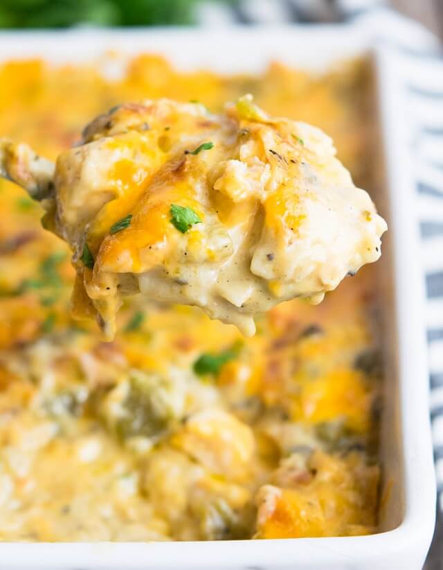 Layers of shredded chicken, creamy sauce, crunchy tortillas, and spicy peppers.
