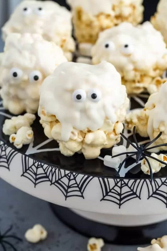 Get festive with 12 Halloween popcorn ideas that combine sweet and spooky flavors for party snacks everyone will devour!