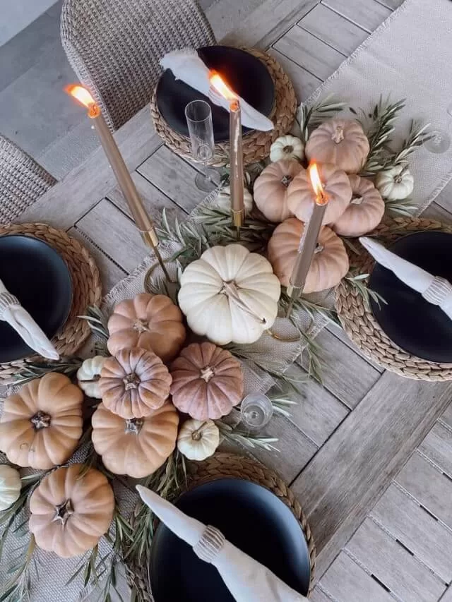 White and blush tones with greenery create an airy design.